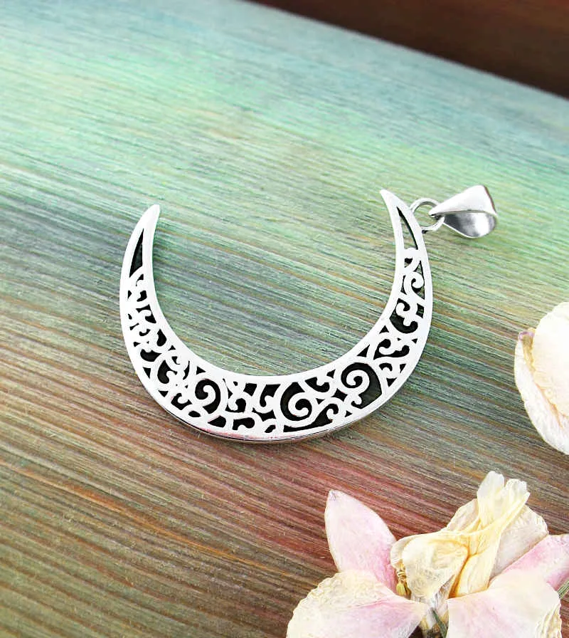 Crescent Moon With Decorative Spirals and Swirls Pendant